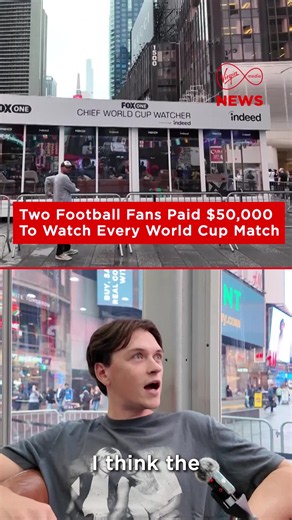 Two football superfans are being paid $50,000 to watch all 104 World Cup games - from a glass-walled studio in Times Square. One even quit his job and broke up with his partner for it. More on Virgin Media PLAY #VMNews