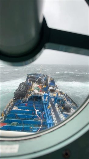 Storm watch. Ship moving through heavy seas.