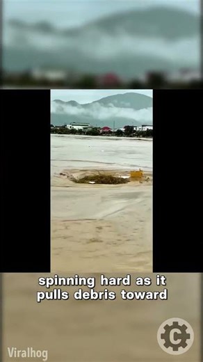 Rare Whirlpool Swirling Through Flooded River in Da Nang!