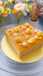 Mango, peach & oolong tea layer cake🥭🍑 Soft almond sponge brushed with peach oolong syrup and topped with mango peach confit cremeux, oolong butterfly pea flower whipped ganache and mango glaze. This is the cake I made for @babylovett_brand x @bkkmenu and I got inspired by a cute yellow & blue striped t-shirt from babylovett’s signature collection (I’ll share the photo in my story)💛 The oolong butterfly pea tea creates a beautiful, natural blue hue and has a subtle floral flavor that goes per