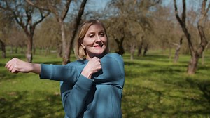 Free stock video - Woman stretching outdoors