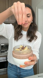 High protein overnight oats made with Greek yogurt and water instead of milk! 👌 INGREDIENTS ½ cup greek yogurt ½ cup water 2 tablespoons maple syrup 1 cup Oath Oats Crunchy Dark Chocolate 1 tablespoon chia seeds INSTRUCTIONS 1. Mix greek yogurt and water in a bowl until combined. Add maple syrup and mix. 2. Add Oath Crunchy Dark Chocolate and chia seeds and stir to combine. 3. Refrigerate overnight and add toppings of choice. I added sliced bananas and cacao nibs | Feel Good Foodie
