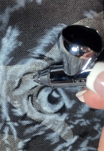 Usually I would finish up the white background but today I really wanted to start the contrast with transparent black just to make airbrushing today fun and not repetitive 💪✍️ #art #artistsoftiktok #airbrush #airbrushing #painting @Iwata Airbrush Official