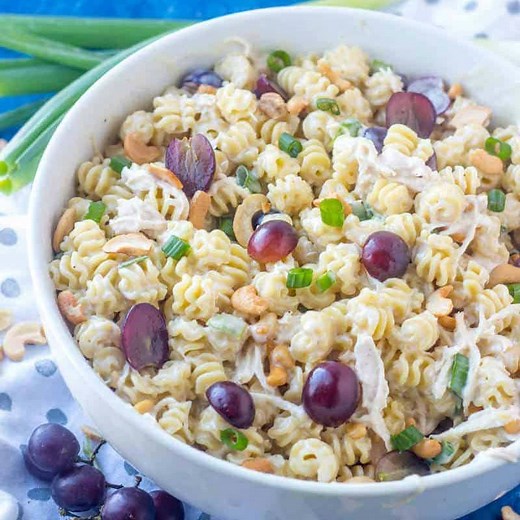 Easy, tasty and filling this Easy Cashew Chicken Pasta Salad is a fun and delicious Spring and Summer salad filled with chicken, grapes, cashews and green onions! Recipe: https://tornadoughalli.com/easy-cashew-chicken-pasta-salad/ | Tornadough Alli