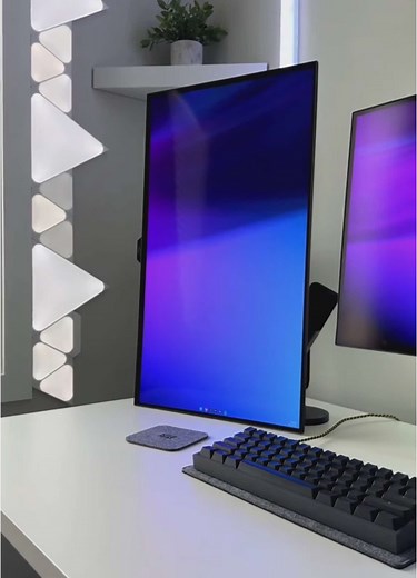Sleek Minimal Gaming Desk Setup with Dual Monitors
