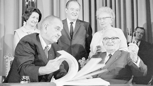 Johnson Signs Medicare Bill Into Law