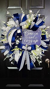 Give your front door a fresh look with this Cozy Up Wreath! 💙 Perfect for spring, summer, or all year long. The bold navy and mixed ribbons make a statement—and adding a little extra greenery takes it to the next level! 🌿 ✨ ✨ #wreath #everydaywreath #cozyup #wreathsupplies #wreathmaker #homedecor | The Wreath Shop