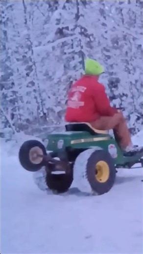 Snowmobile Skis on a Lawn Mower