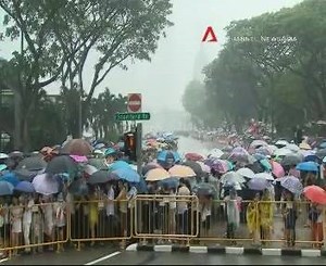 VIDEO: Heavy rain pours down across Mr Lee Kuan Yew's State Funeral Procession route as crowds patiently await for it to begin. cna.asia/lkystatefuneral | CNA