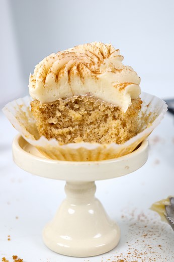 These spice cupcakes are made with brown sugar and warm spices! They bake up moist and tender, and are topped with delicious cream cheese frosting! Get the recipe here: https://chelsweets.com/spice-cupcakes/ | Chelsweets