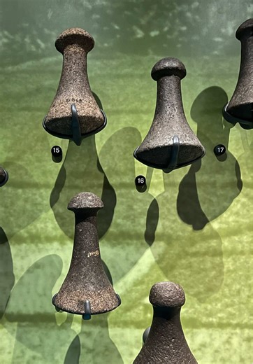 A pōhaku kuʻi ʻai is the traditional stone tool used to pound kalo into poi. After kalo is cooked, it’s placed on a wooden papa kuʻi ʻai (pounding board). The pōhaku kuʻi ʻai is then used to break it down and mash it until it becomes the smooth consistency we know as poi. These stones were carefully shaped from dense basalt so they could handle repeated pounding without breaking. Many were passed down through generations and became important family tools. Poi isn’t just food. It was a Hawaiian s