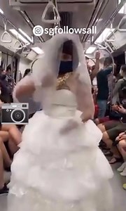 Man dressed as a bride doing an utterly insane dance on the SMRT fit for the mental hospital. When people start doing the most insane stuff just to get views on tiktok...you know that they are insane. Credits : SGFOLLOWSALL | Singapore Breaking News Network