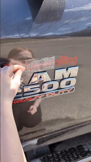 putting vinyl decals on truck