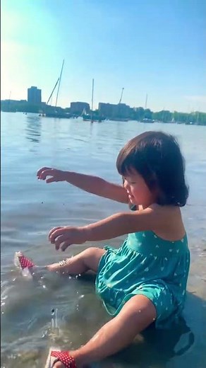 Cute little girl play at the beach