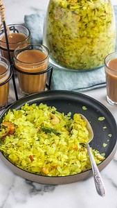 ✨ Crunchy, nutty, and perfectly spiced… my Poha Chivda is the ultimate Diwali snack! 💛 Comment “chivda” and I’ll DM you the recipe 🙌🏽 It’s that spot on mix of crispy poha, roasted nuts, and a hint of sweetness that you just can’t stop munching on 🤩 A must-have in every festive snack box — make a big batch because it disappears fast! #DiwaliSnacks #IndianSnacks #DiwaliTreats #HomemadeWithLove #FestiveVibes #DesiSnacks #DiwaliReady #EasyIndianRecipes Full recipe: https://ministryofcurry.com/po