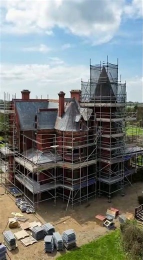 grand abandoned Victorian mansion in the English countryside