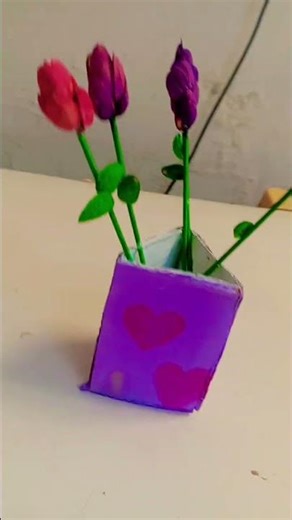 d i y with ice cream sticks and pista shell with cardboard flower vase