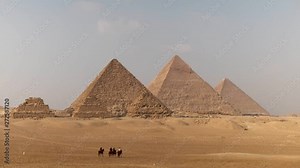 Beautiful pyramids of Egypt in Africa. A historic site right next door to Cairo and Giza in Africa. Exploring the site with camels and local Arabic people.