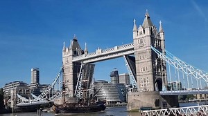 Gotheborg, world's largest wooden sailing ship, passes through Tower Bridge