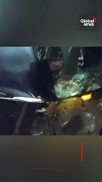 Police bodycam footage captures moment woman rescued from burning vehicle