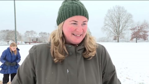 Families enjoy season's first snow at Richmond park: 'We are building a snowman'