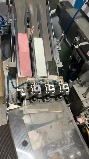 Toothbrush making machine