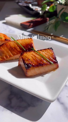 Miso Salmon (Nobu Style)...this and crispy rice are my go to orders there… Ingredients: •1/4 cup mirin. •1/4 cup sake. •1/3 cup miso paste. •1/3 cup cane sugar. •2 lb salmon (deboned, cut into filets). Directions: 1.- Boil the mirin and sake for 3 min. 2.- Add in sugar and miso. Cook a couple min without boiling. Let it cool. 3.- Pour it all over your fish, cover it VERY tightly and marinate for 24 hrs in fridge. 4.- Broil it (I did 7 min) but every oven is different so keep an eye out. #salmon 