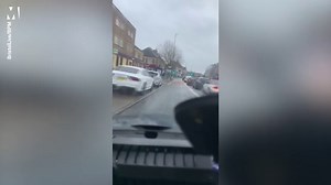 Driver sparks debate by using bus lane to skip traffic queue