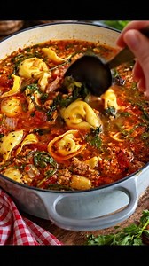Every time I make this tortellini soup, I’m transported back to chilly evenings at my mom’s kitchen table, where the laughter was as warm as the broth. You can’t help but indulge in a second bowl—trust me, it’s that good! Recipe’s waiting for you in the comment 👇 | Recipes & Cooking Guide