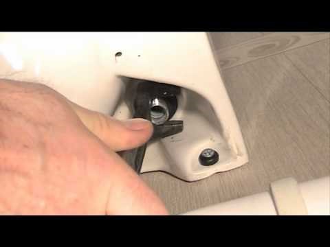 Using Basin wrench to tighten a loose tap