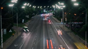 Highway traffic cars driving time lapse at multiple lane speedway
