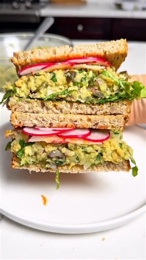 Eva Molenda on Instagram: "I used to love egg salad sandwiches… but once I went vegan, I wanted something that felt even more nourishing, not just a replacement. Follow @splashofgoodness for more healthy recipes. This avocado chickpea salad sandwich is creamy, hearty, and packed with plant-based protein and fiber. Perfect for lunch, meal prep, or an easy dinner when life gets busy. I make it the night before, and it tastes even better the next day 🤍 📖 Full recipe with instructions on my blog �