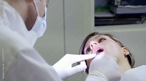 Dentist visiting, inspecting mouth and dental hygiene of patient