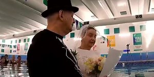 Couple swim into love with wedding in YMCA pool where they first met