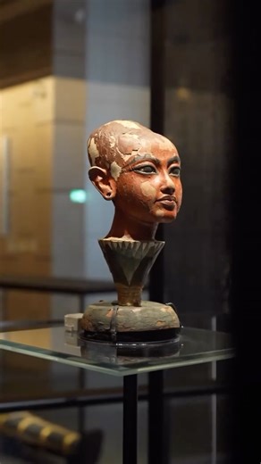 Grand Egyptian Museum on Instagram‎: "The carved head of Tutankhamun portrays the young king as the youthful god Nefertem, emerging from a lotus blossom at the dawn of creation in ancient Egyptian belief. The blue base represents the primeval waters from which the lotus rose. Opening at dawn and closing at dusk, the lotus symbolized continuous rebirth and became a powerful emblem for a king seeking eternal life. يُجسِّد هذا الرأس الملك توت عنخ آمون في هيئة المعبود الشاب نفرتوم، الذي خرج من زهرة 