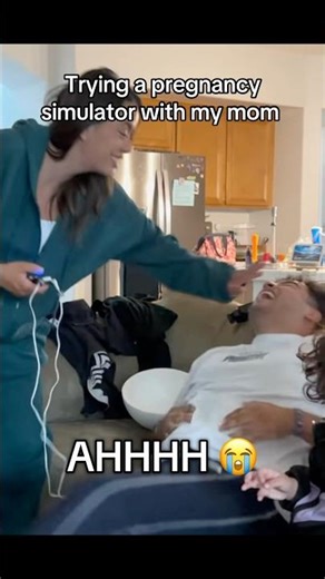TRYING A PREGNANCY SIMULATOR WITH MY MOM!