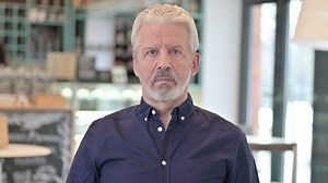 Portrait of Graceful Old Man Looking at Camera