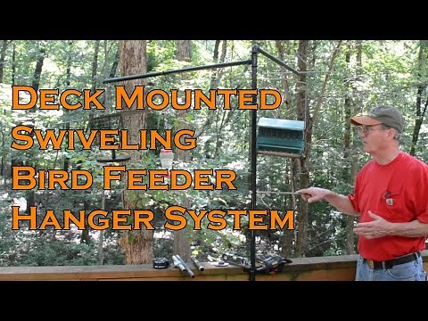 Do it yourself, easy to use pivoting bird feeder system for deck.