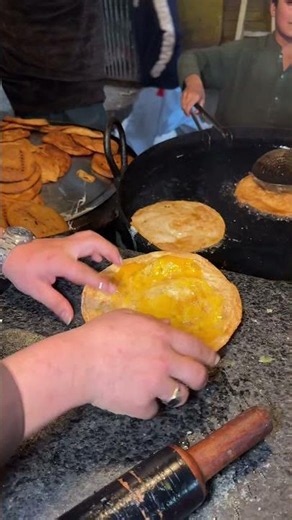Frying paratha then mix egg with it and then fry in hot boiling oil | street food experiences