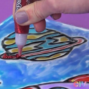 31K views · 232 reactions | Have fun painting the galaxy & let the light shine through! This week's Crayola CIY will teach you how to turn a picture frame into galaxy art with DIY black glue and Crayola Watercolours.   #CrayolaCIY #SummerMakerSeries #CraftsforKids | Crayola | Facebook