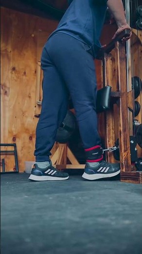 DIY standing hamstring curl and low row tower attachment for garage gym