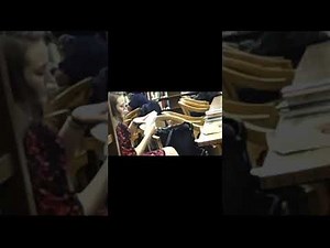 Extreme shoeplay dangling in library (shoedrop)
