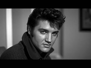 Why did Elvis laugh uncontrollably while recording this serious song?