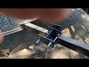 Enclosed trailer Spare tire mount on tongue.