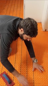 DITRA-HEAT cable tips...keep cables 2 inches from walls or cabinets. I also run cables 12 inches in front of the toilet flange and 4 inches away from tubs or heat sources. Many thanks to Schluter for providing the supplies for my client’s heated floor project 🔥#heatedfloor #ditraheat #homerepairtutor #brandpartner | Home Repair Tutor