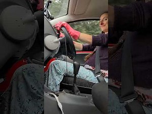 Driving with pink rubber gloves???