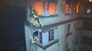 Raw: Crews battle deadly high-rise fire in Paris