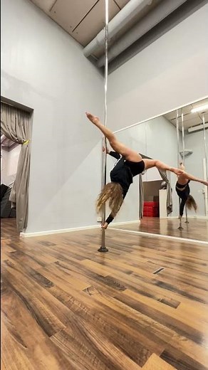 Woman Smoothly Dances on Pole - 1376455
