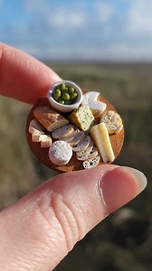 Little cheese boards on holiday 🧀 I've spent the last few days staying in a cosy little cabin nestled amongst native trees in the Waitakere Ranges. It hasn't all been great beach weather (it's winter after all!) but it's been perfect weather for curling up with a book, taking things slowly, and eating cheese. . . . . . #piha #miniature #miniaturefood #polymerclay #newzealand #waitakere #pihabeach #staycation | Moon Lighting