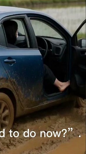 girl car stuck mud